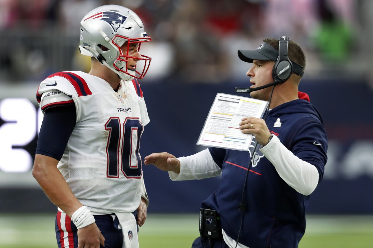 Head Coach Josh McDaniels talks to the media postgame