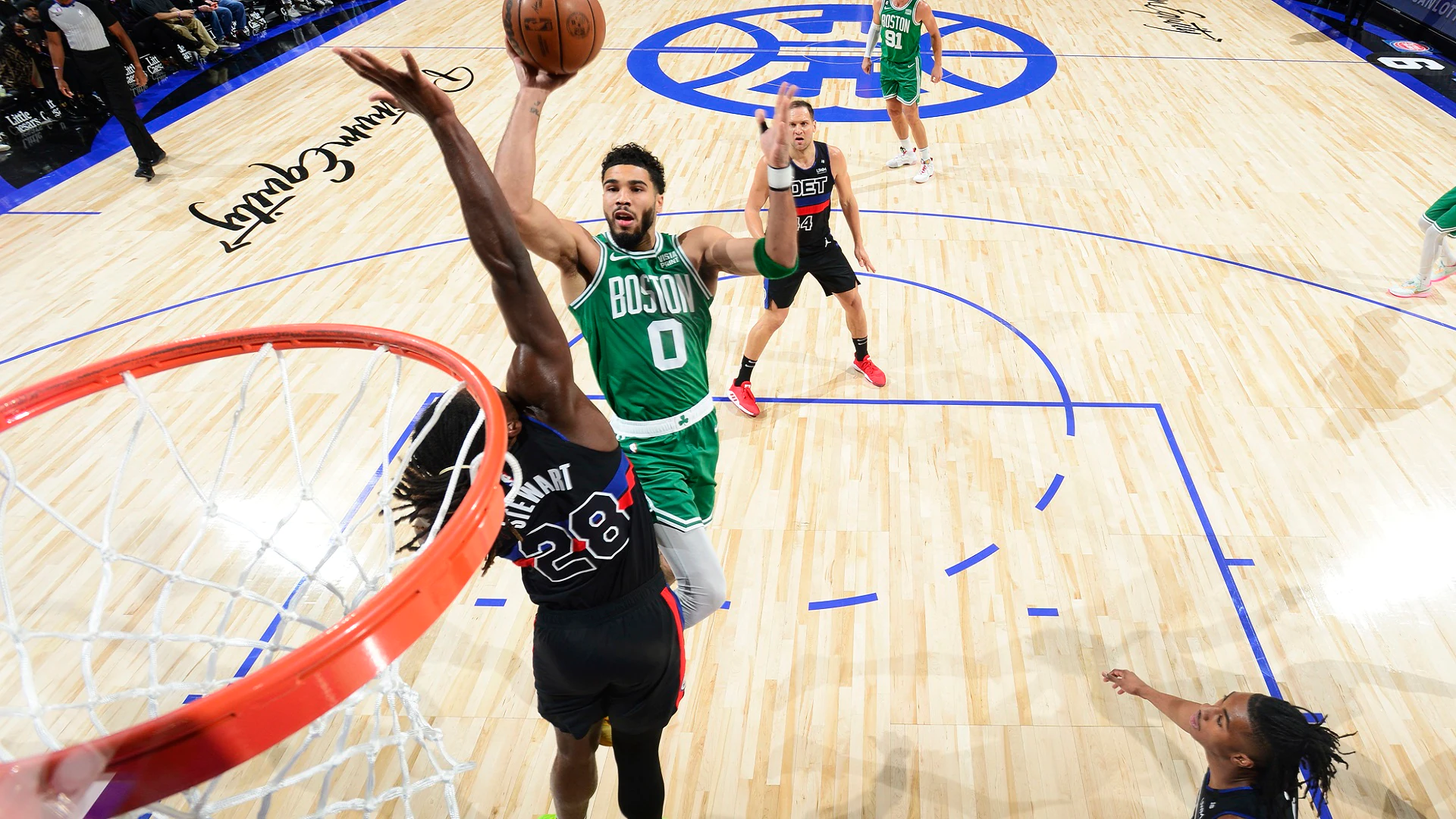 Mac Jones and Jayson Tatum celebrate the Celtics win in Game 7