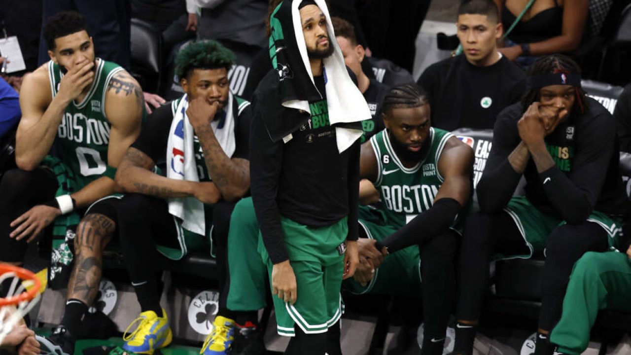 Mac Jones and Jayson Tatum celebrate the Celtics win in Game 7